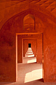 Corridor of sandstone in buildings beside the Taj Mahal, Agra, India.