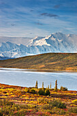 Morning light and clouds over Mt. McKinley (Denali) and Wonder Lake, Denali National Park and Preserve, Interior Alaska.