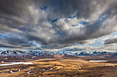 View of the Nigu river looking south at the Brooks range mountains, Gates of the Arctic National Park, Alaska.