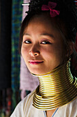 'Portrait of a woman from the Long Neck Karenni hill tribe; Thaton, Chiang Rai, Thailand'