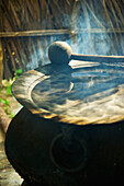 'Heat and smoke from a pan; Ulpotha, Embogama, Sri Lanka'