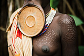 'Traditional scarring on Surma woman with lip plate, Omo region, Southwest Ethiopia; Kibish, Ethiopia'