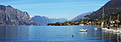 'Boats moored in a harbour of Lake Garda; Malcesine, Verona, Italy'