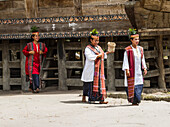 Toba Batak people dressed in traditional costume at Huta Bolon Museum in Simanindo village on Samosir Island, Lake Toba, North Sumatra, Indonesia