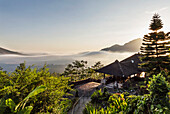 Panoramic view of Batur Lake and Mount Agung at sunrise from Kintamani, Bali, Indonesia