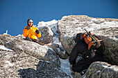 A climber belays his partner through the mountain crux in the Coquihalla Recreation Area of British Columbia, Canada.