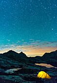 Glowing tent and stars in the Bear Lakes area of the High Sierra