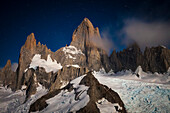 Moonlit Mount Fitzroy from the summit of Cerro Madsen in Argentina's Los Glaciers National Park.