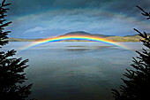 Low Arching Rainbow Over The Waters Of Clover Passage, Ketchikan, Southeast Alaska, Spring