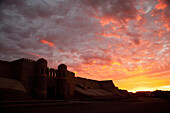 'South Gate (Tosh Darvosa) at sunrise, Ichan Kala Old City, Khiva, Kizilkum desert; Khwarezm region, Uzbekistan'