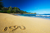 'I love you written in the sand on Tunnels Beach; Kauai, Hawaii, United States of America'