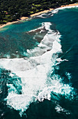 'Surf meets the beach at Haena; Haena, Hawaii, United States of America'