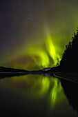 'Northern Lights as seen from Echo Cove, Lions Head and Berners Bay in the distance, Tongas National Forest; Juneau, Alaska, United States of America'