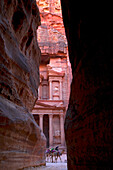 Glimpse of the Treasury from the Siq, Petra, UNESCO World Heritage Site, Jordan, Middle East