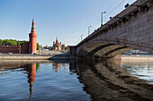 Bridge over the River Moskva with the Kremlin and St. Basil's Cathedral in the distance, Moscow, Russia, Europe