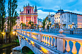 Franciscan Church of the Annunciation and bridge over the Ljubljanica River, Ljubljana, Slovenia, Europe