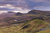 Dawn over the Trotternish mountain range, viewed from the Quiraing, Isle of Skye, Inner Hebrides, Scotland, United Kingdom, Europe