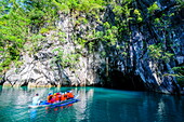 Tourists in a rowing boat entering the Puerto Princesa underground river, the New Wonder of the World, Puerto-Princesa Subterranean River National Park, UNESCO World Heritage Site, Palawan, Philippines, Southeast Asia, Asia
