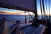 Sailing boat, yacht at dawn on the Atlantic ocean, Sailing