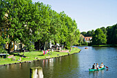 Canoeing on the river Trave, Lubeck, Schleswig-Holstein, Germany