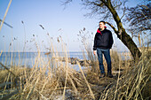 Man at the beach, Rankwitz, peninsula Lieper Winkel, Usedom, Mecklenburg-Vorpommern, Germany