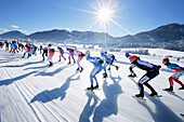 Female ice speed skaters on lake Weissensee, Alternative Eleven cities tour, Weissensee, Carinthia, Austria