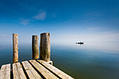 Boat in calm water, Hallig Langeness, North Frisian Islands, Schleswig-Holstein, Germany