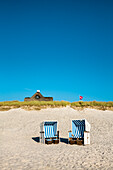 Beach chairs and thatched house, Kampen, Sylt Island, North Frisian Islands, Schleswig-Holstein, Germany