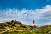 Thatched house and lighthouse, Hoernum, Sylt Island, North Frisian Islands, Schleswig-Holstein, Germany