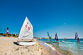 Beach and lighthouse, windsurfs on the beach, Hoernum, Sylt Island, North Frisian Islands, Schleswig-Holstein, Germany