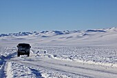 UAZ bus in the Mongolian steppe in winter, Mongolia