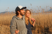 Young couple near lake Grosser Alpsee, Immenstadt, Bavaria, Germany