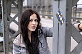 Young woman on Hacker Bridge, Munich, Bavaria, Germany
