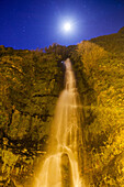 Waterfal at night during the full moon, Madeira, Portugal, Europe.