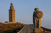 Breogan statue and Tower of Hercules, Roman lighthouse, Coruña city, Galicia, Spain.