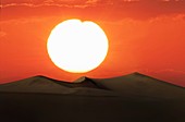 Sossusvlei, Namibia. Sunset over sand dunes in Namib desert.