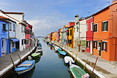 Colorful houses alongside canal, Burano, near Venice, Veneto, Italy, Europe.