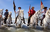 Gardians horsemen that works with bull of Camargue Blessing at sea Procession during annual gipsy pilgrimage at Les Saintes Maries de la Mer may,Camargue, Bouches du Rhone, France