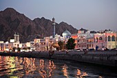 Oman, Muscat, Mutrah, skyline at dusk