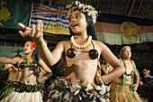 Atiu Island. Cook Island. Polynesia. South Pacific Ocean. Children dressed in traditional Polynesian dances and interpret Polynesian dances organized at Hotel Villas Atiu Atiu island. The Cook Islands lie northeast of New Zealand in the South Pacific Ocea