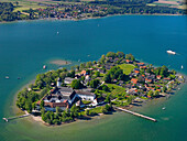 Aerial shot of Fraueninsel with Gstadt am Chiemsee in background, lake Chiemsee, Bavaria, Germany