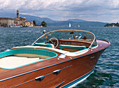 Wooden runabout on lake Garda, Salo, Brescia, Lombardy, Italy