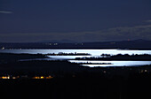 Full moon over Chiemsee with ist islands, Chiemsee, Bavaria, Germany