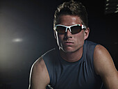 Runner in sunglasses at starting line