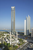 Mosque and modern skyscraper downtown Abu Dhabi, UAE