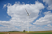 Wind park with wind turbines in a rapeseed field, bio-energy, renewable energy, near Gunzenhausen, Mittelfranken, Lower Franconia, Franconia, Bavaria, Germany, Europe