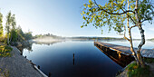 wooden pier, bathing pier at lake Kirchsee near Sachsenkamm in Spring at sunrise, moorland lake, Ellbach and Kirchseemoor nature reserve, Landkreis Bad Toelz- Wolfratshausen, Upper Bavaria, Bavaria, Germany, Europe