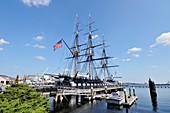 USS Constitution the oldest commissioned US Naval warship docked at the Charlestown Navy Yard Boston Massachusetts USA on a beautiful sunny summer day