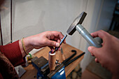 Jeweller inserting a gemstone, Vellberg, Schwaebisch Hall province, Baden-Wuerttemberg, Germany