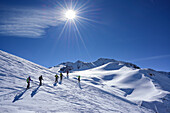 Several persons back-country skiing ascending towards Frauenwand, Frauenwand, valley of Schmirn, Zillertal Alps, Tyrol, Austria